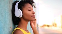 Girl listening music with headphones